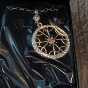 Elegant Gold and Silver Pendant Necklace